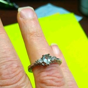 Very pretty silver ring with blue stone...